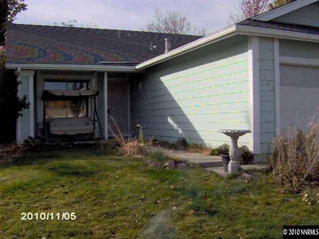 7583 Water View Way Reno, NV 89511 - Photo 1 of 7 a backyard of a house with dishwasher and garden