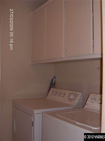 7583 Water View Way Reno, NV 89511 - Photo 6 of 7 a utility room with dryer and washer