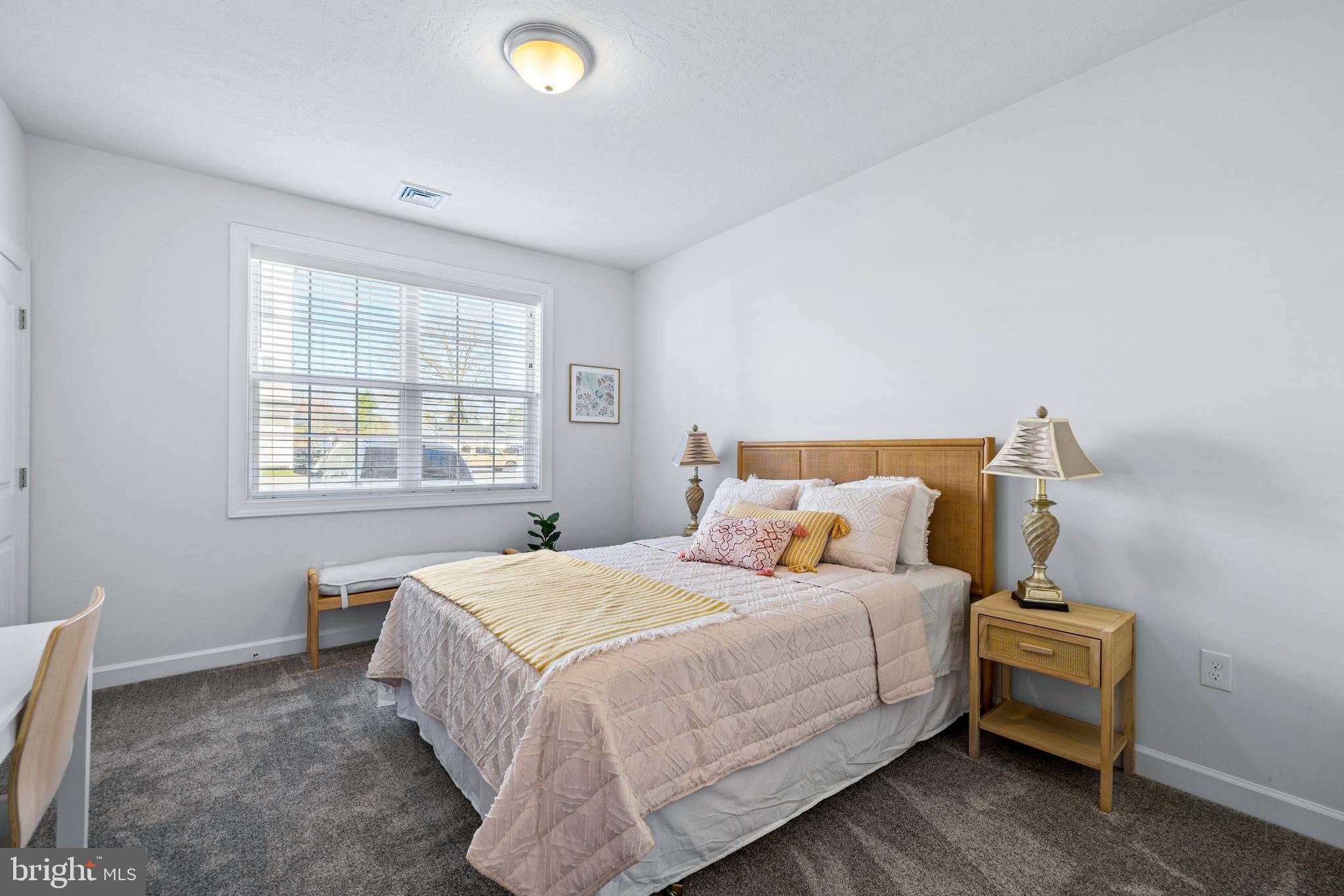 1001 Admiral Lane, Unit 315 Hanover, PA 17331 - Photo 17 of 36 a bedroom with a bed and a window