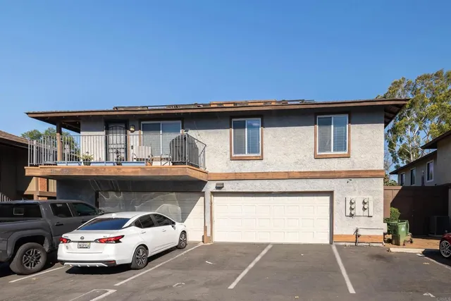 a view of car parked in front of house