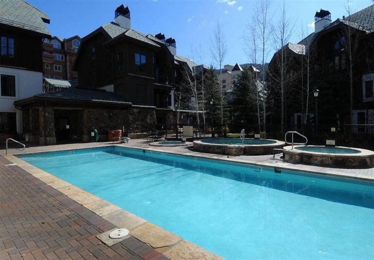 63 Avondale Lane, Unit R215 Beaver Creek, CO 81620 - Photo 24 of 26 a view of swimming pool with outdoor seating and yard
