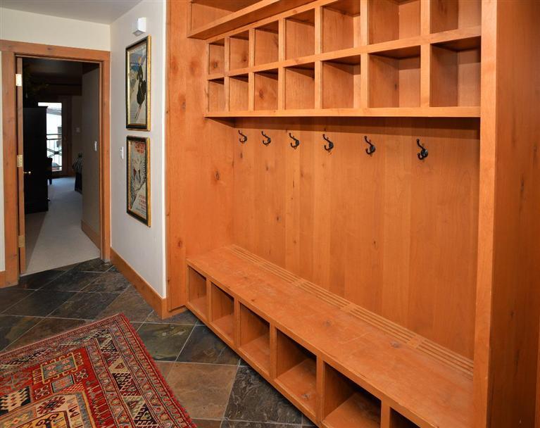 63 Avondale Lane, Unit R215 Beaver Creek, CO 81620 - Photo 9 of 26 a hallway with windows