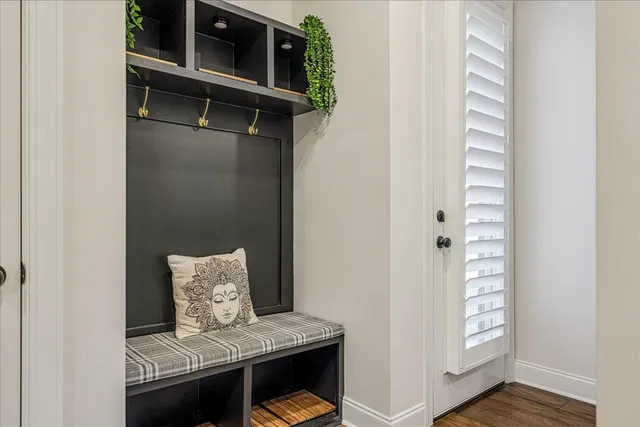 a view of a livingroom with furniture and wooden floor