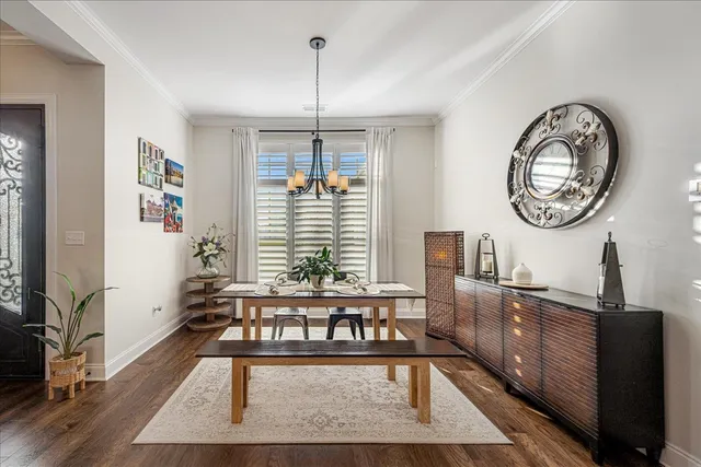 a view of a room with a dining table chairs and couches