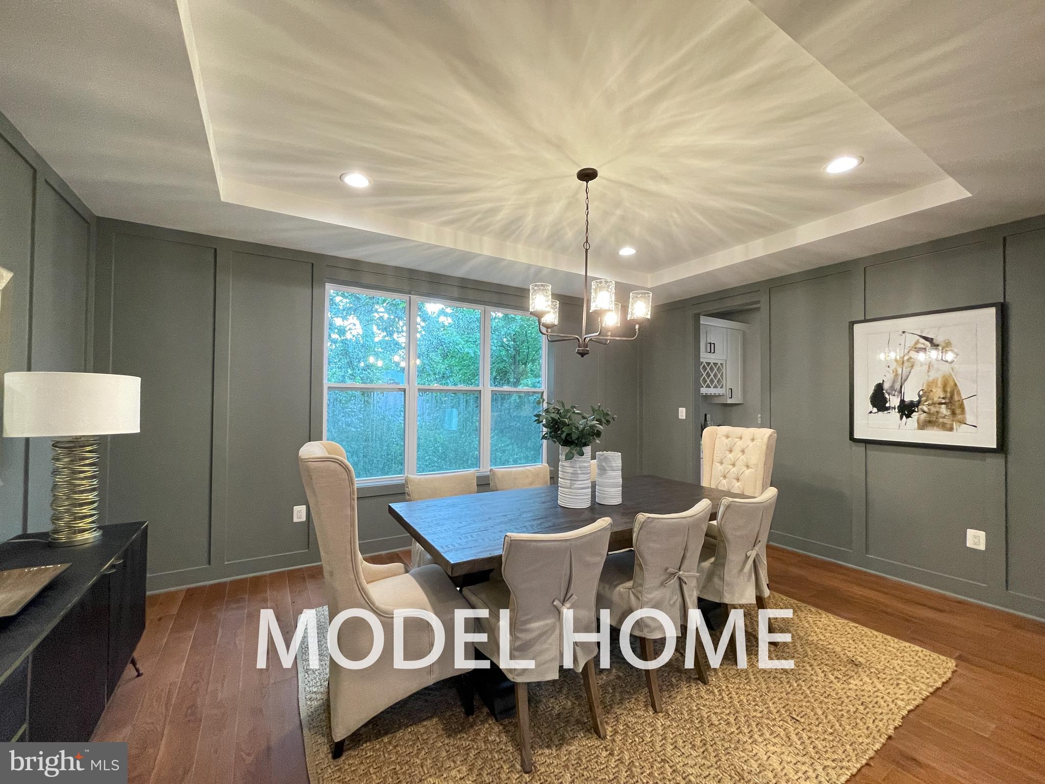 536 Walker Street Southwest Vienna, VA 22180 - Photo 4 of 57 a view of a dining room with furniture a chandelier and wooden floor