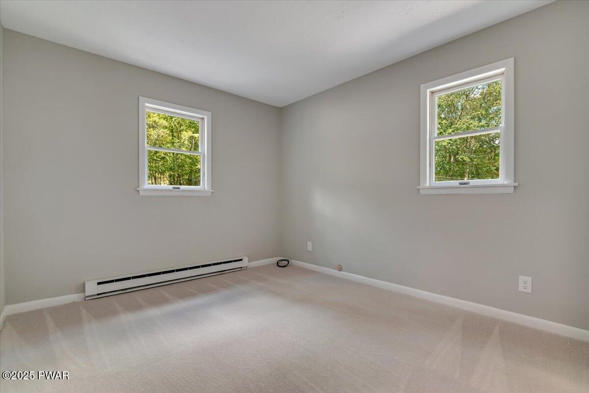 107 Kiel Road Milford, PA 18337 - Photo 29 of 71 an empty room with windows