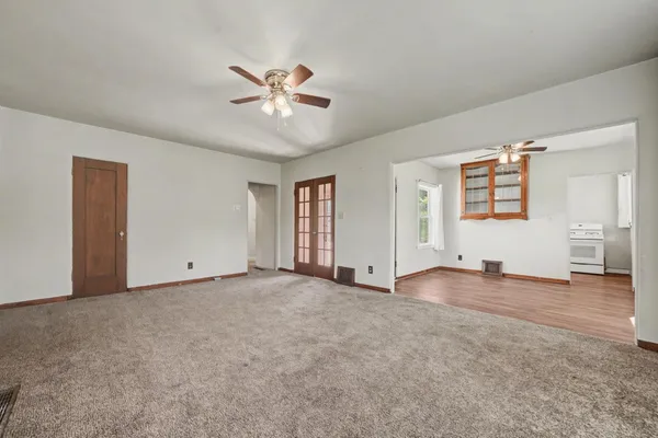 a view of an empty room with window