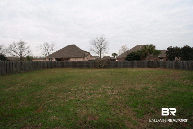 9689 Bella Drive Daphne, AL 36526 - Photo 24 of 28 View of fenced yard