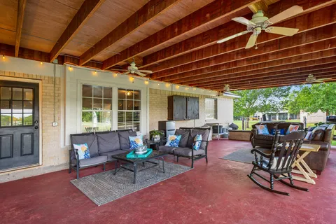 a outdoor space with lots of tables and chairs