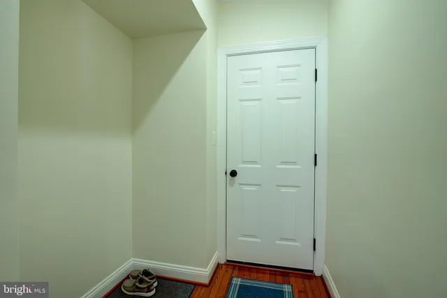 a workspace with furniture and a window