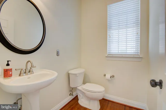 a spacious bedroom with a bed and window