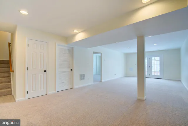a view of a hallway with windows
