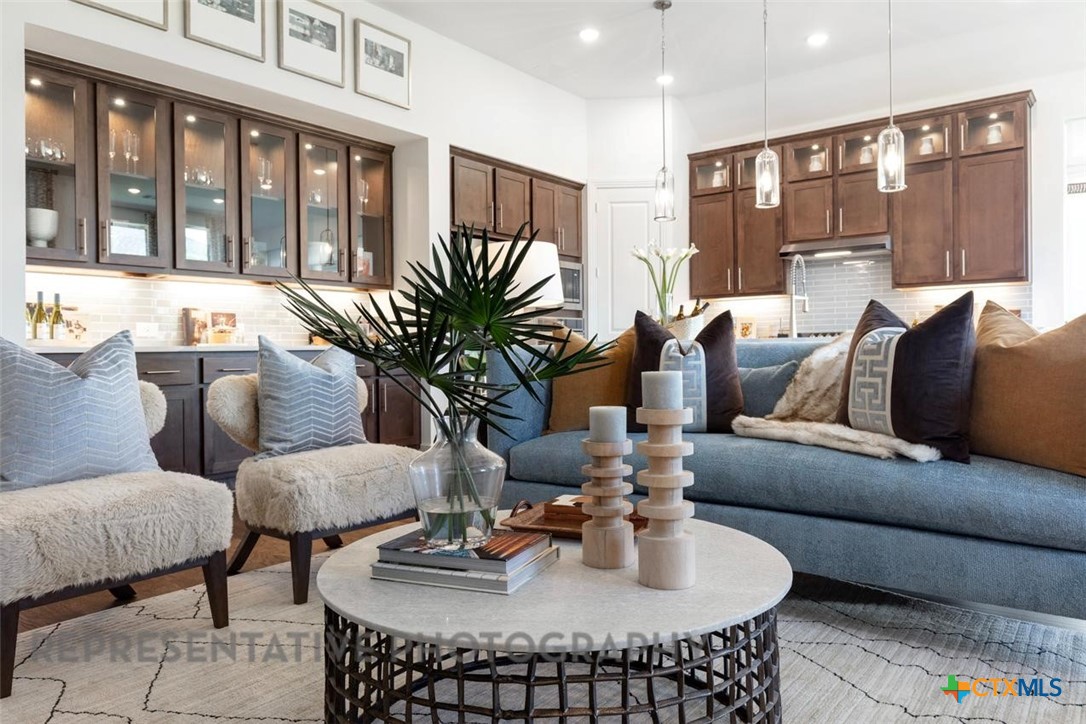 148 Pigeon River Road Kyle, TX 78640 - Photo 12 of 40 a living room with furniture