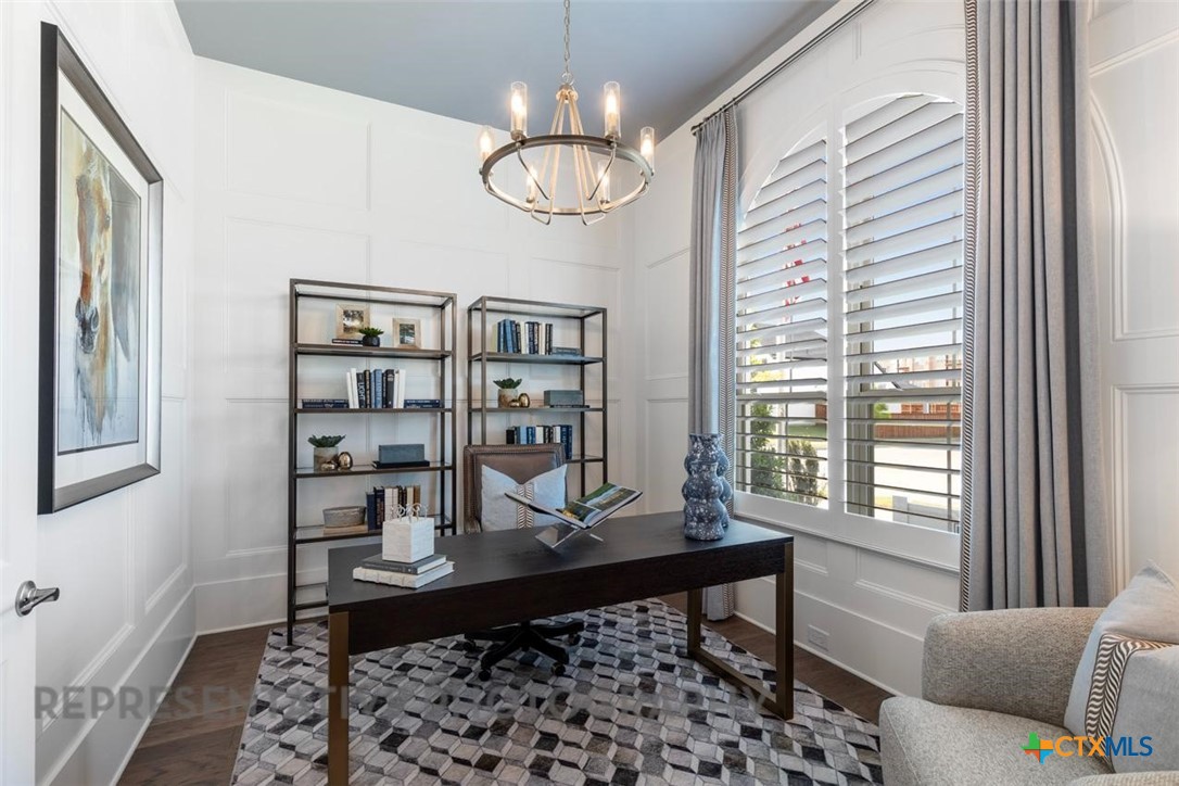 148 Pigeon River Road Kyle, TX 78640 - Photo 23 of 40 a living room with furniture and a window