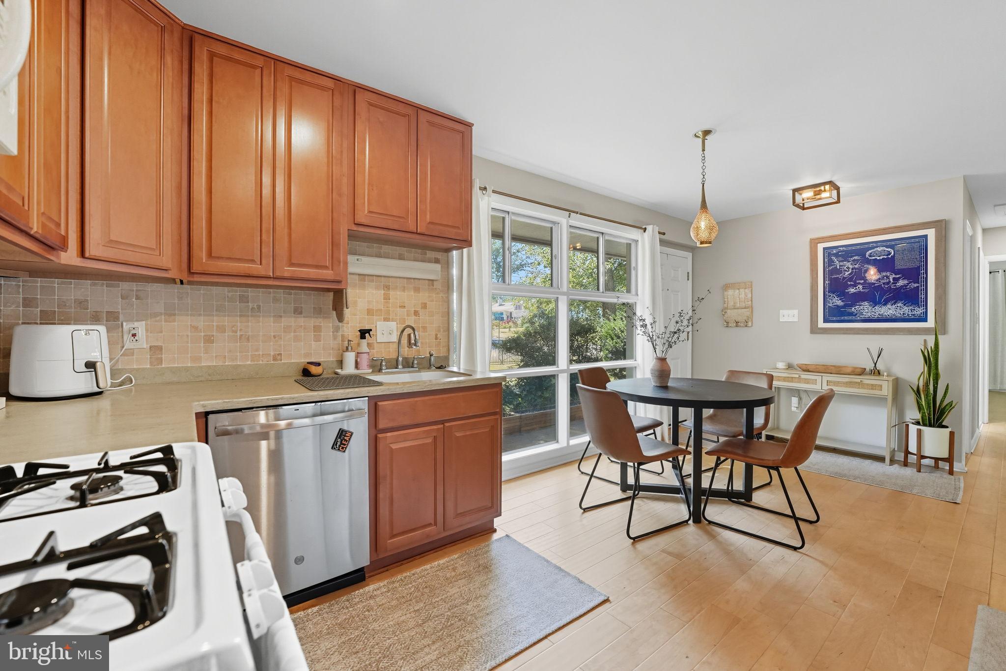 7317 Floyd Avenue Springfield, VA 22150 - Photo 18 of 33 Bright and inviting kitchen with modern charm.