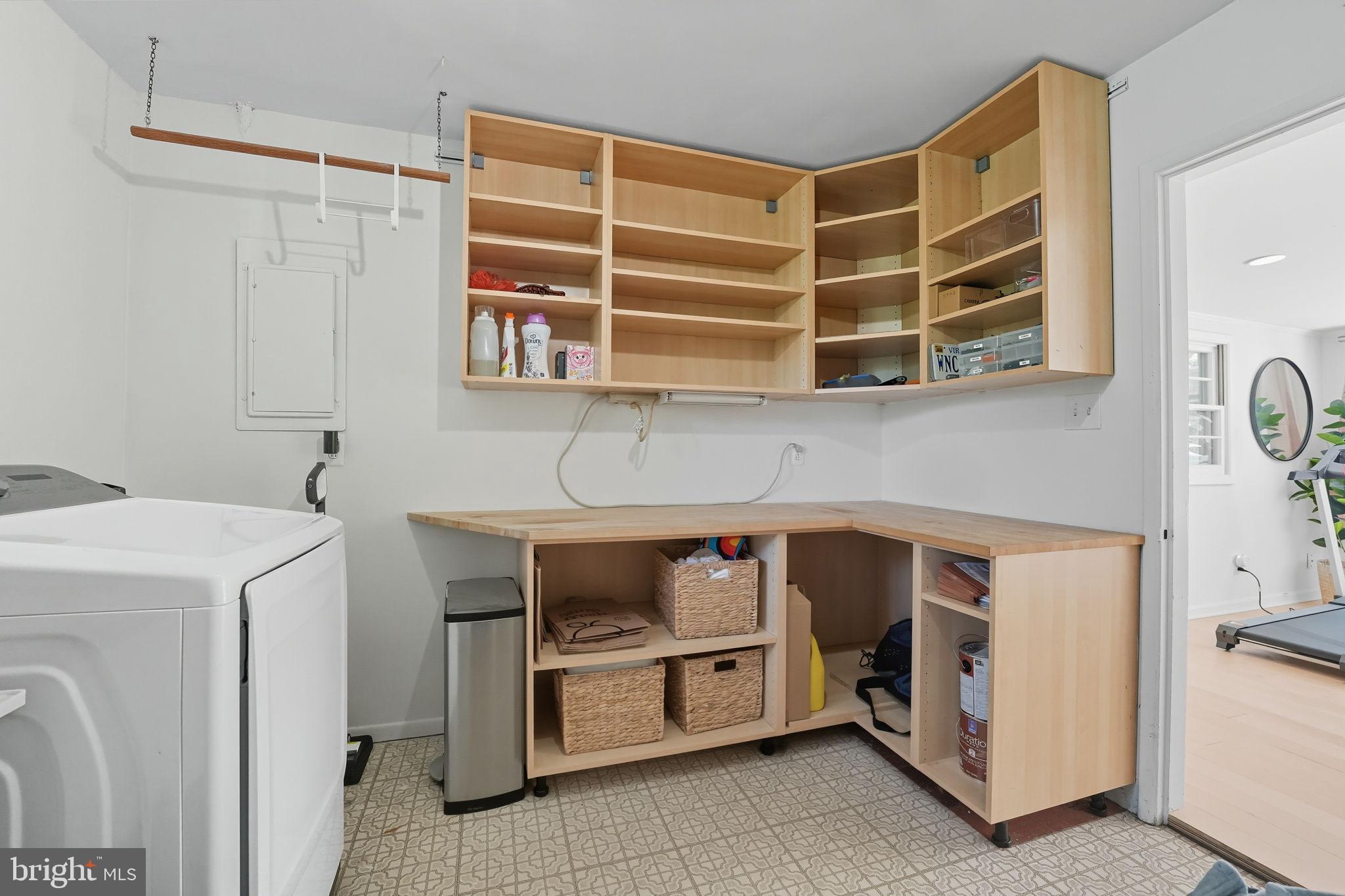 7317 Floyd Avenue Springfield, VA 22150 - Photo 24 of 33 Functional laundry space with ample storage.