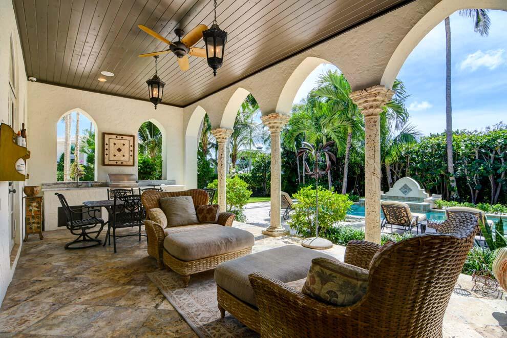 1054 Melaleuca Road Delray Beach, FL 33483 - Photo 12 of 26 a outdoor living space with furniture potted plant view and a large window