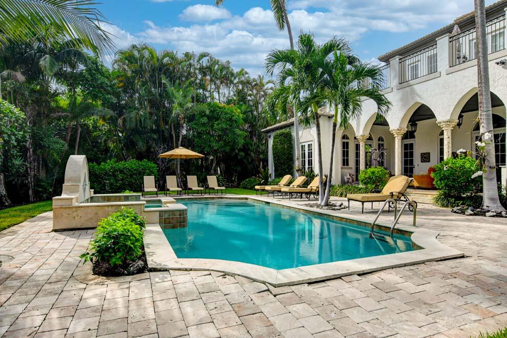 1054 Melaleuca Road Delray Beach, FL 33483 - Photo 13 of 26 a view of a house with swimming pool and sitting area