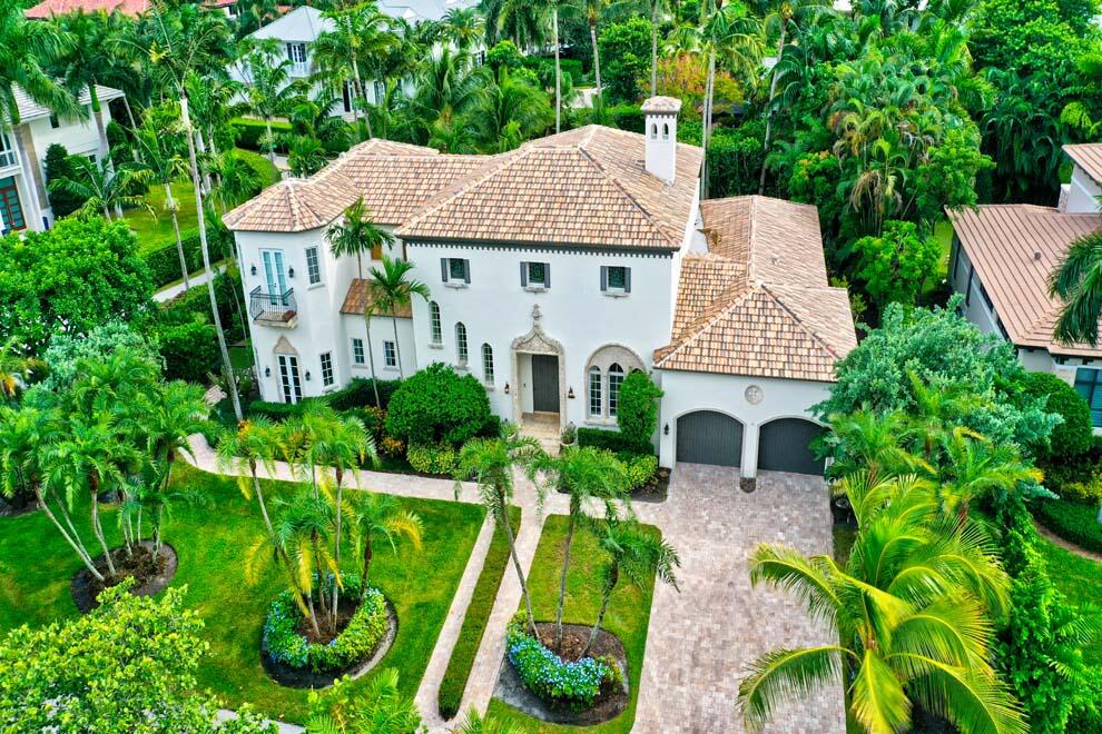 1054 Melaleuca Road Delray Beach, FL 33483 - Photo 4 of 26 a aerial view of a house with garden space and street view