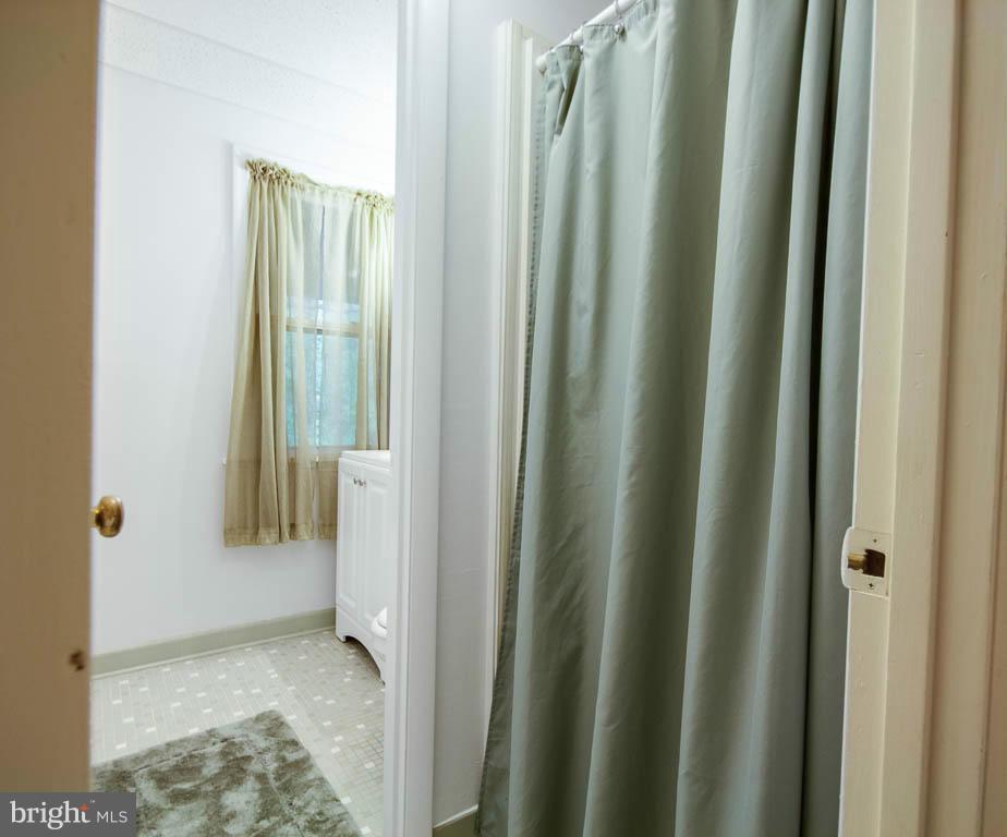 121 Plum Point Road Huntingtown, MD 20639 - Photo 19 of 30 a view of a bathroom
