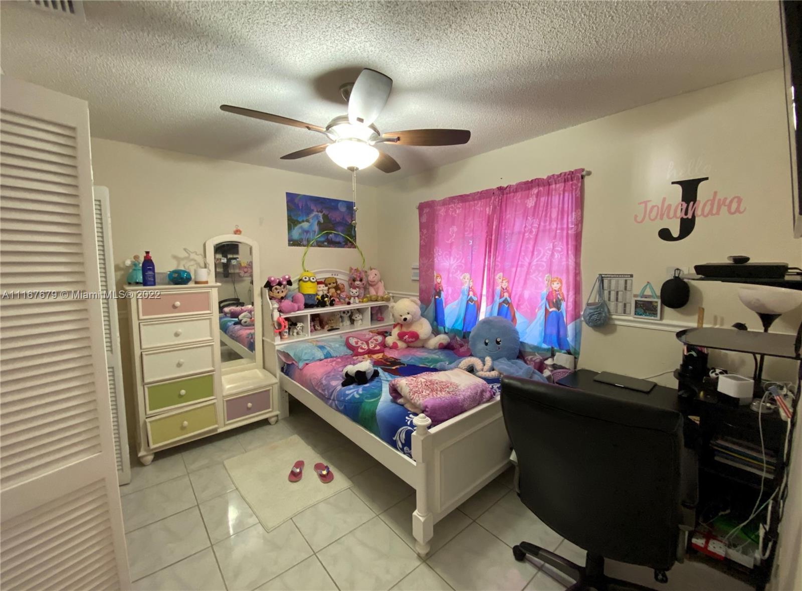 West Kendall Miami, FL 33193 - Photo 11 of 15 a bed room with a bed and a window