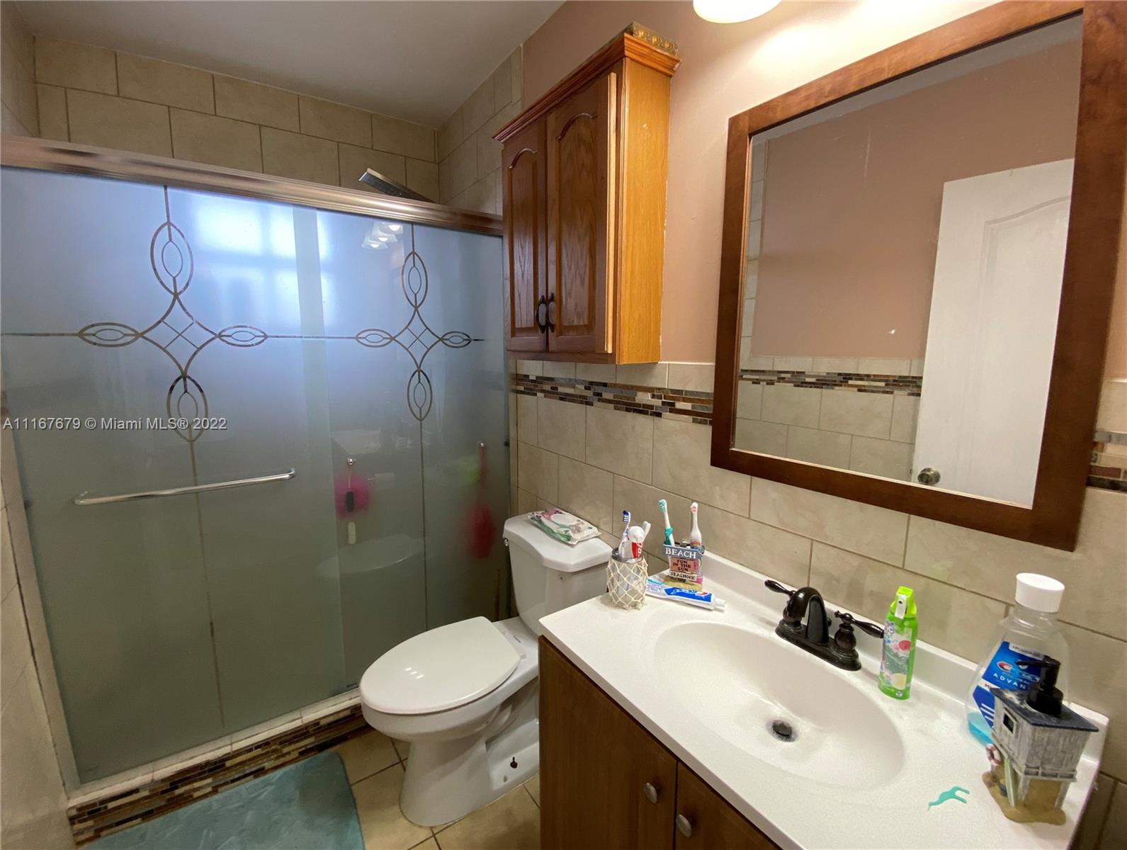 West Kendall Miami, FL 33193 - Photo 13 of 15 a bathroom with a sink toilet and shower