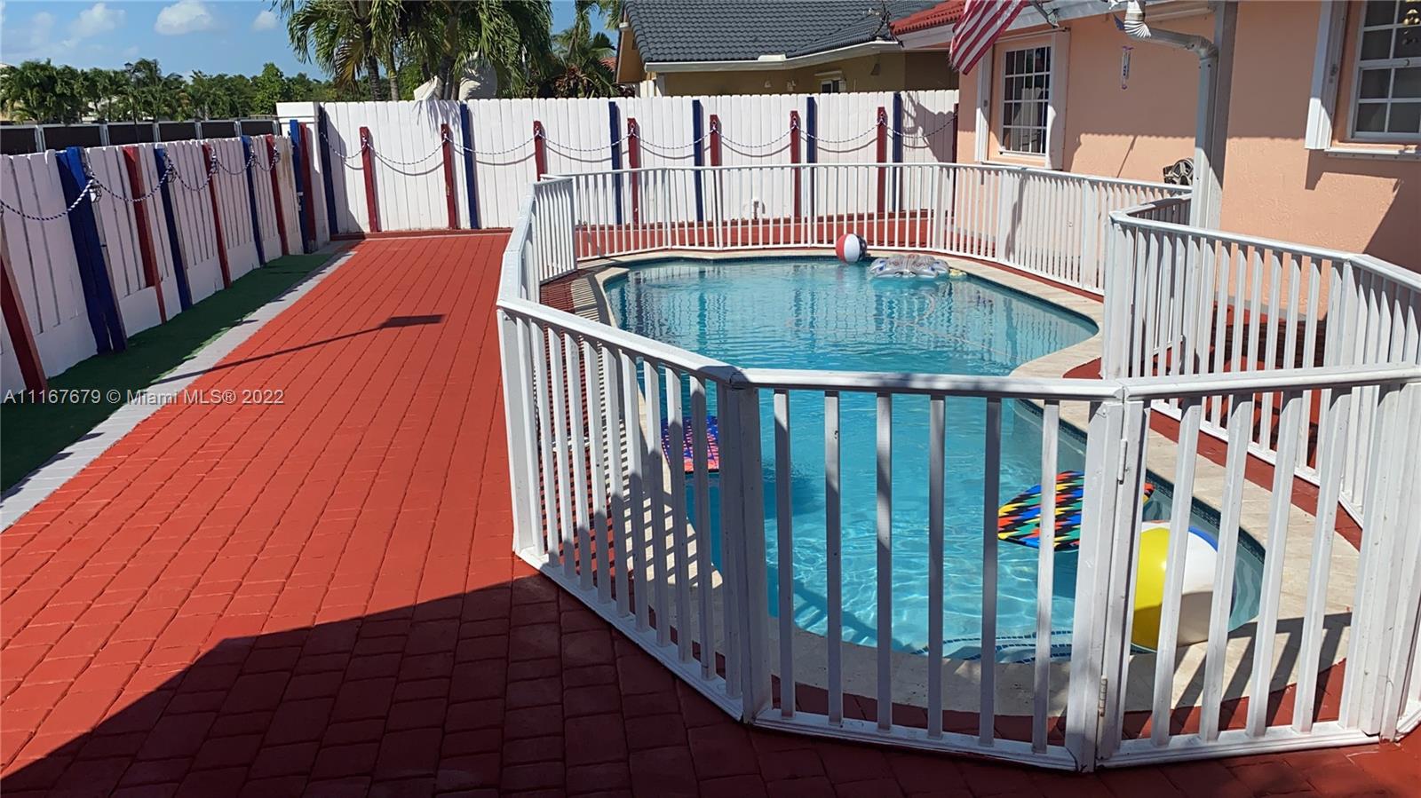 West Kendall Miami, FL 33193 - Photo 3 of 15 a balcony with lots of trees in the background