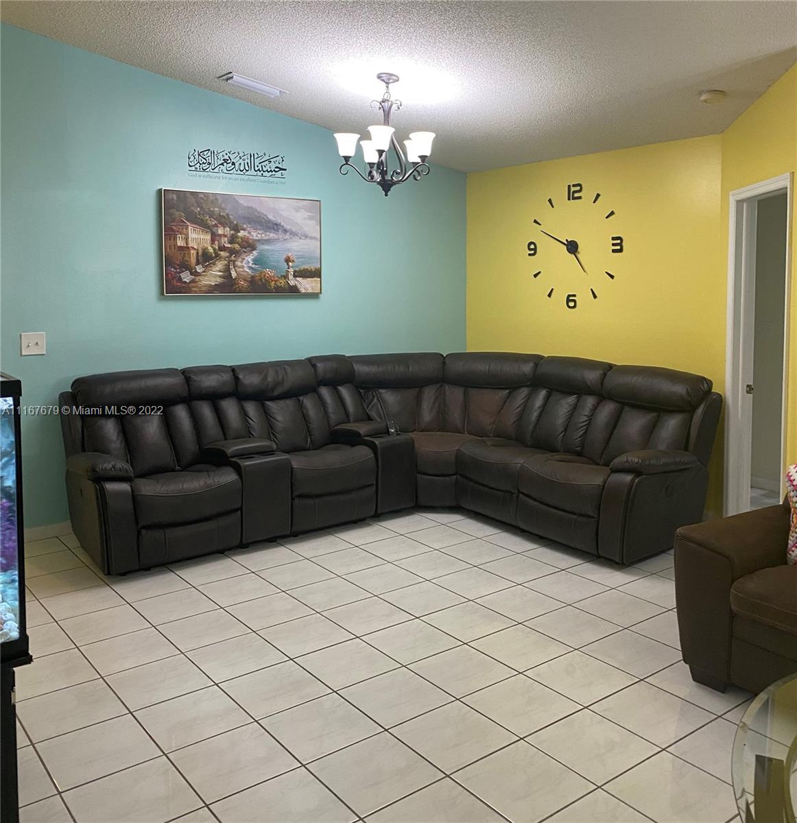 West Kendall Miami, FL 33193 - Photo 5 of 15 a living room with furniture and a couch