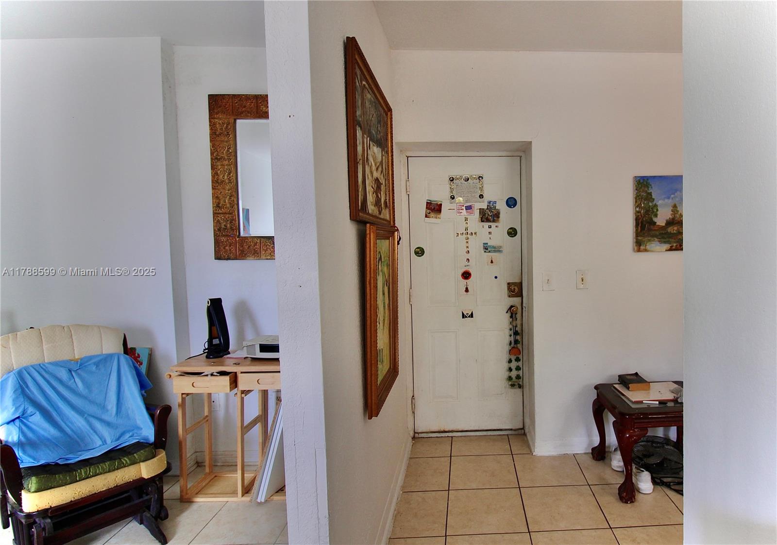 1021 Northwest 3rd Street, Unit 201 Miami, FL 33128 - Photo 13 of 27 a living room with furniture