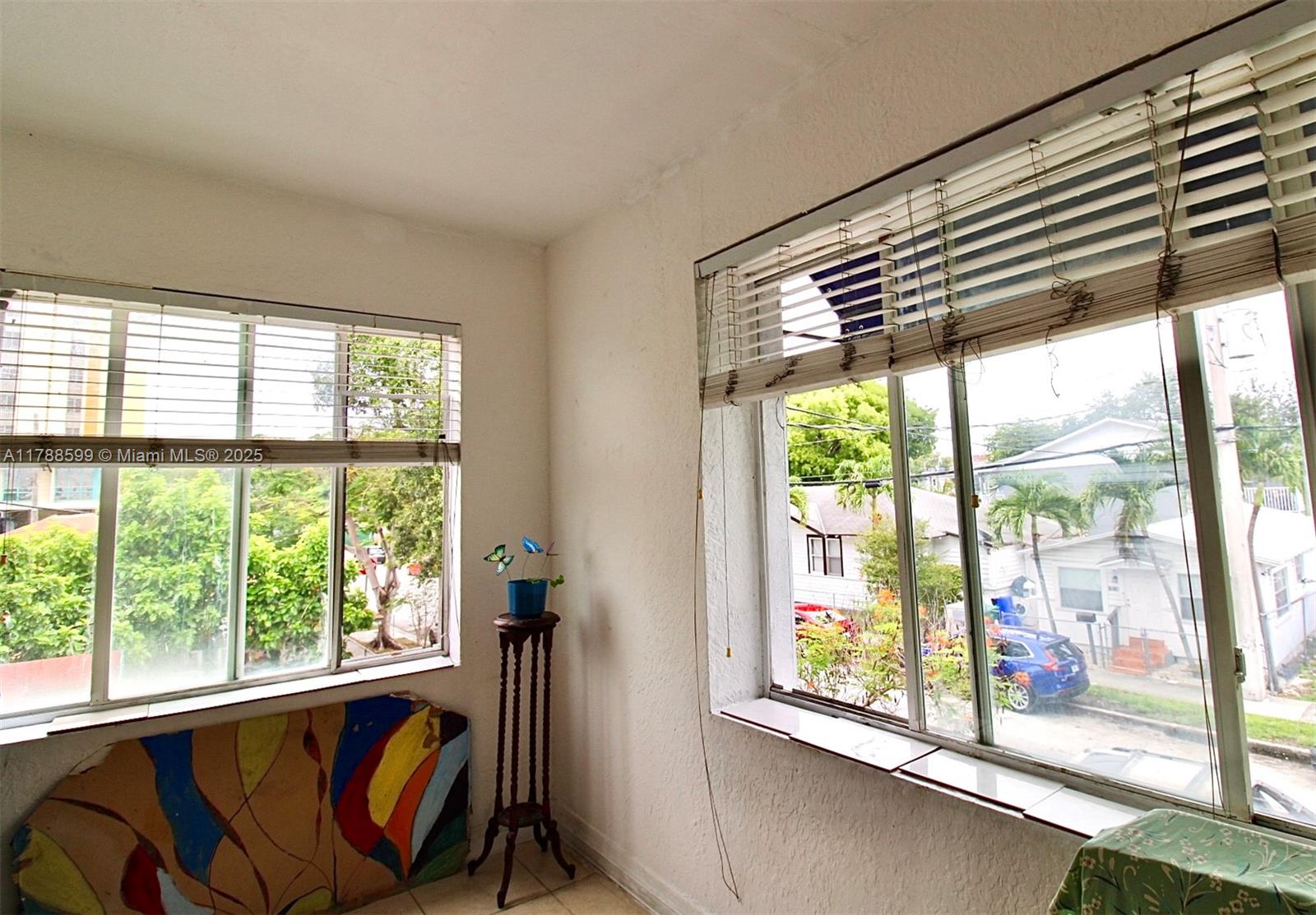 1021 Northwest 3rd Street, Unit 201 Miami, FL 33128 - Photo 2 of 27 a view of a room with window