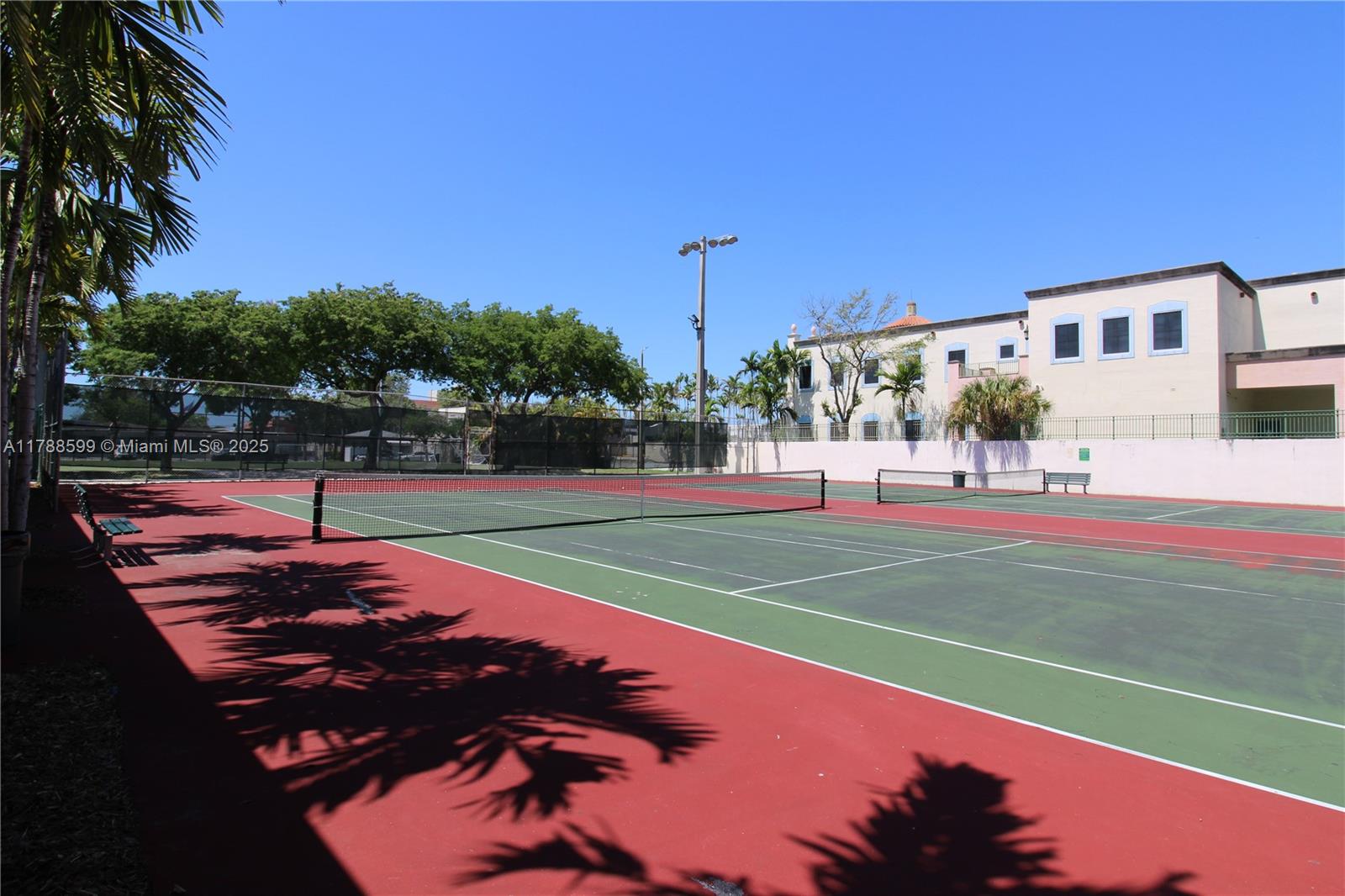 1021 Northwest 3rd Street, Unit 201 Miami, FL 33128 - Photo 22 of 27 a view of a tennis court