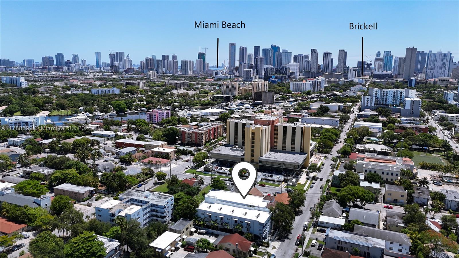 1021 Northwest 3rd Street, Unit 201 Miami, FL 33128 - Photo 26 of 27 a view of a city with tall buildings