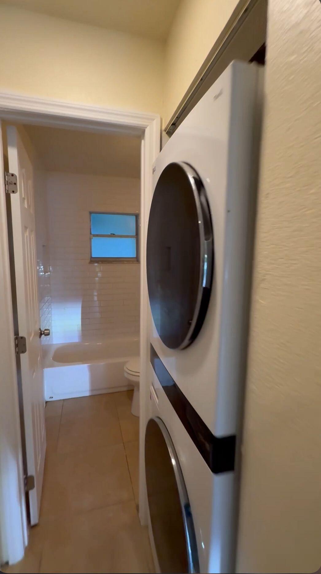 908 Mccray Court, Unit A Fort Pierce, FL 34950 - Photo 6 of 6 a close up view of a washer and dryer