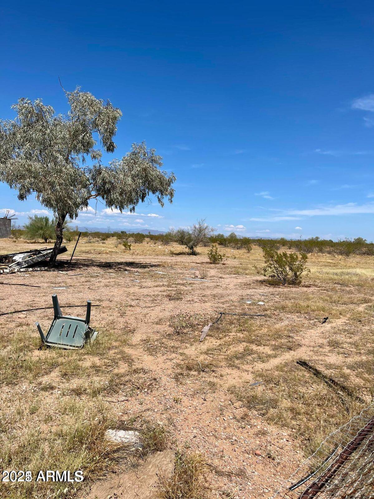 0 West Lone Mountain Road, Unit 249 Wittmann, AZ 85361 - Photo 2 of 3 a view of a lake with outdoor space