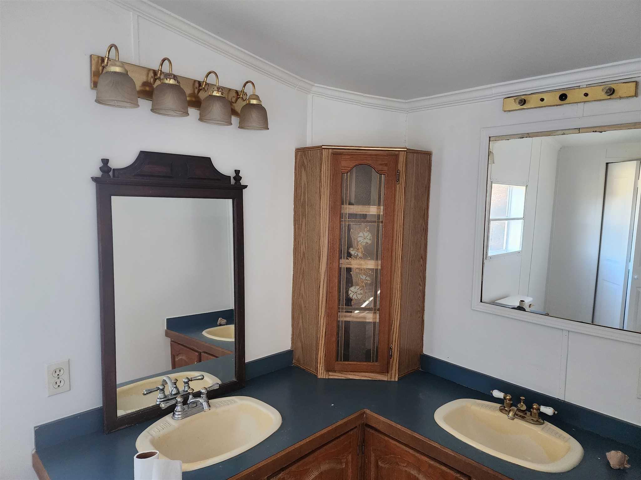 Scenic Road Millerton, NY 12546 - Photo 4 of 7 a bathroom with a granite countertop sink and a mirror