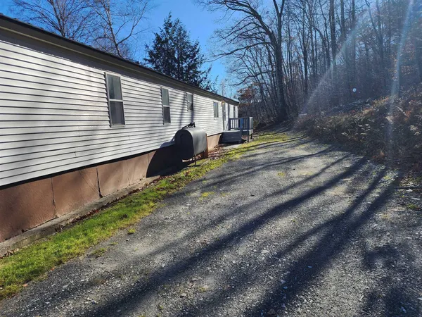 a view of back yard of the house