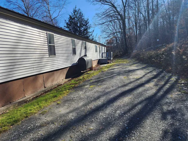 a view of back yard of the house
