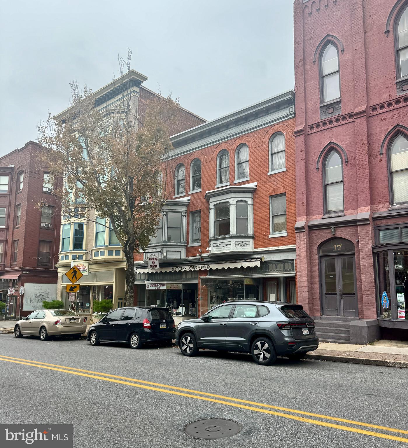 a car parked in front of a building
