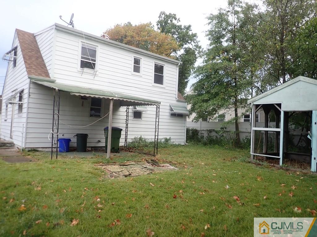 25 Hull Drive Edison, NJ 08817 - Photo 2 of 11 a view of a house with a yard