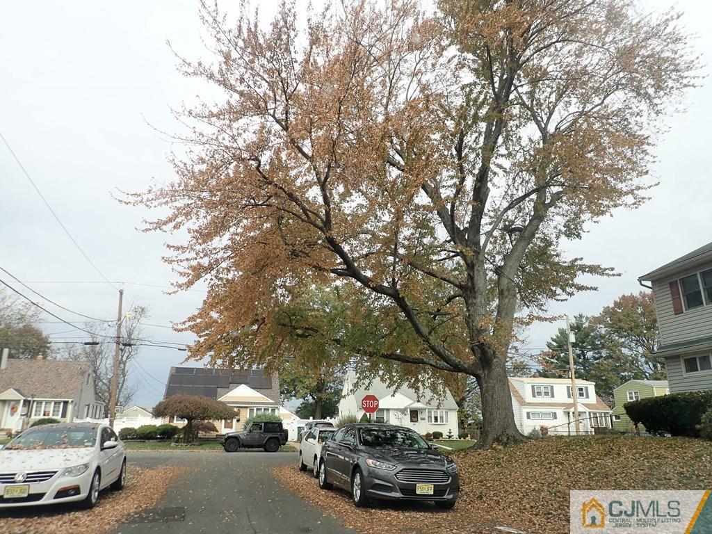 25 Hull Drive Edison, NJ 08817 - Photo 3 of 11 a car parked on the side of a street