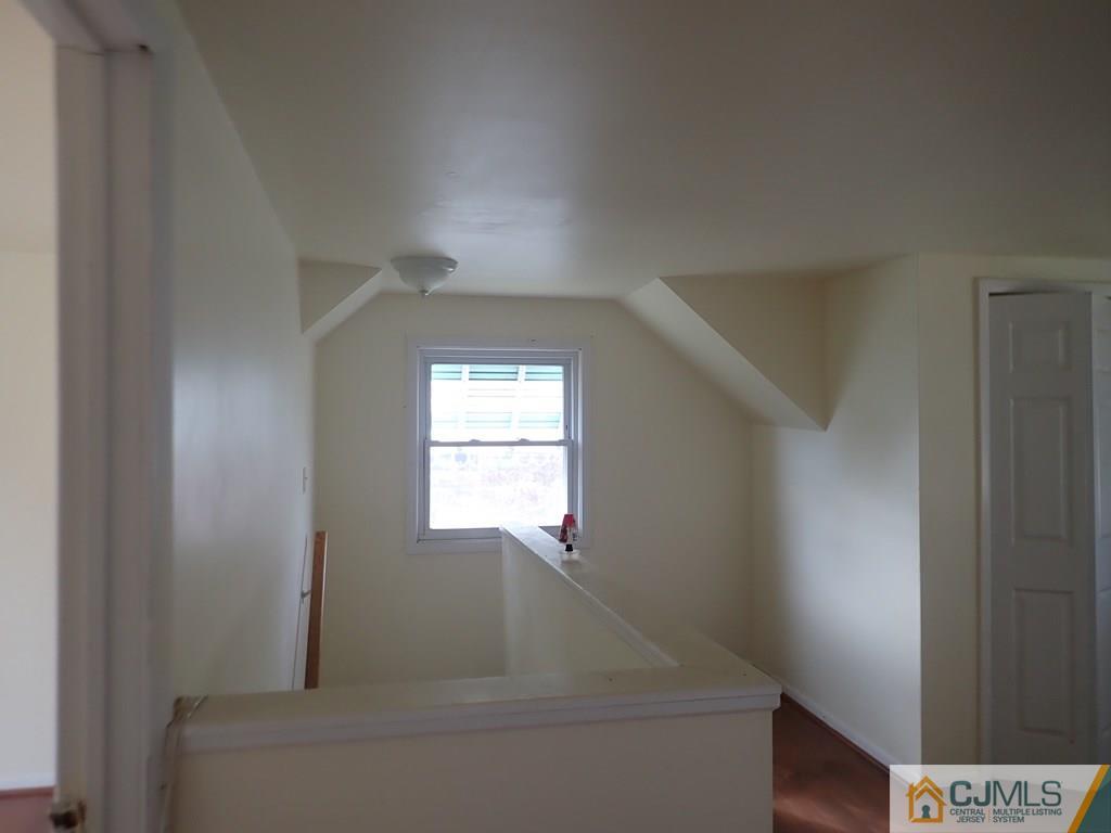 25 Hull Drive Edison, NJ 08817 - Photo 9 of 11 a bathroom with a bathtub
