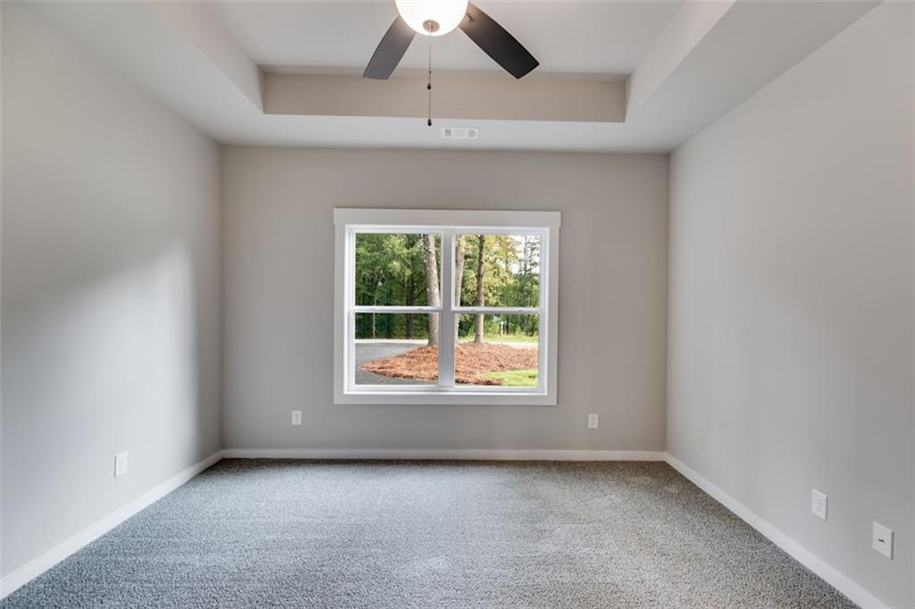 342 Dandy Road Dallas, GA 30132 - Photo 22 of 35 an empty room with a window