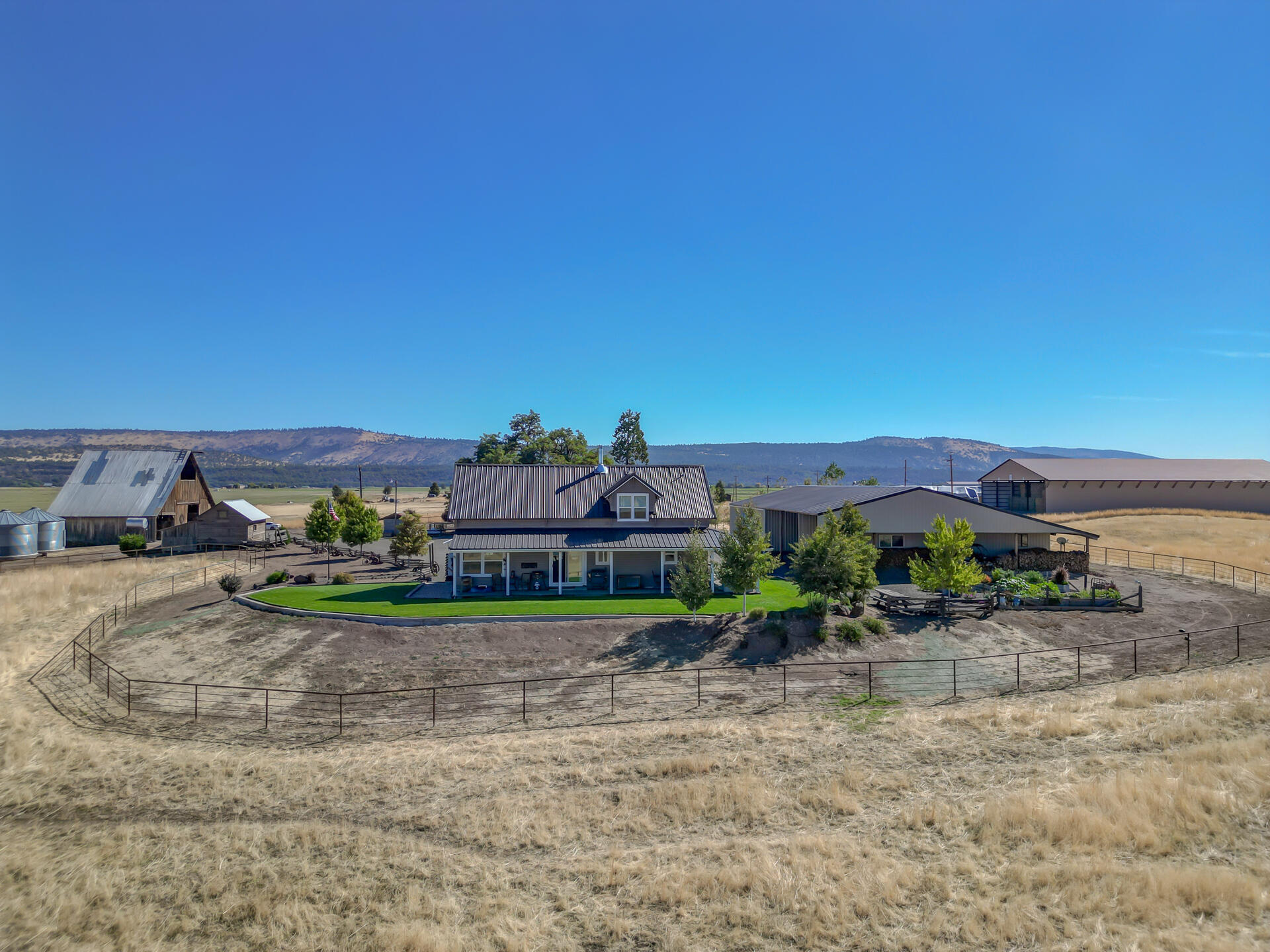 541-105 Pittville Road McArthur, CA 96056 - Photo 12 of 87 a view of a house with a yard and table
