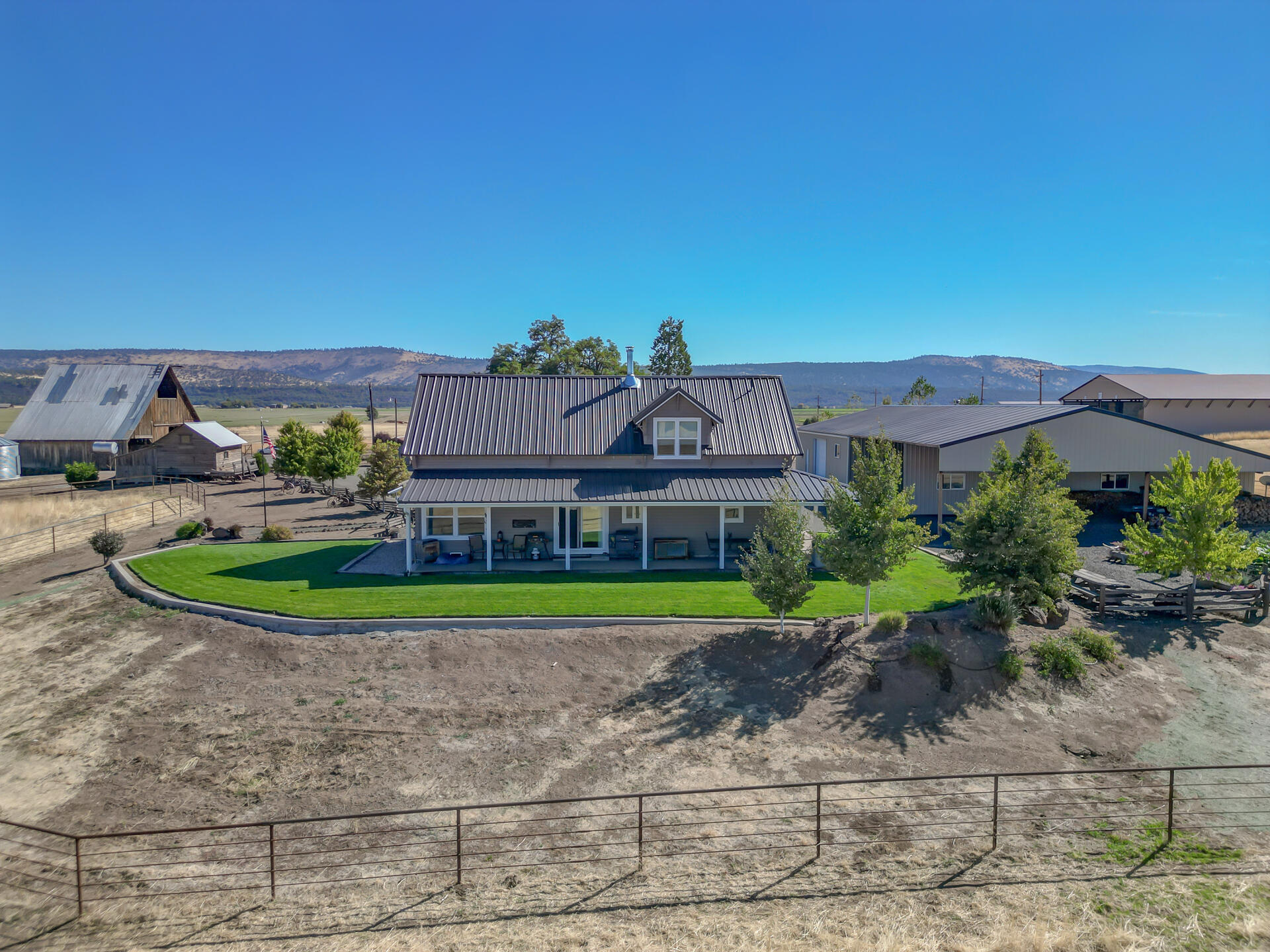 541-105 Pittville Road McArthur, CA 96056 - Photo 13 of 87 a view of a house with a yard and potted plants