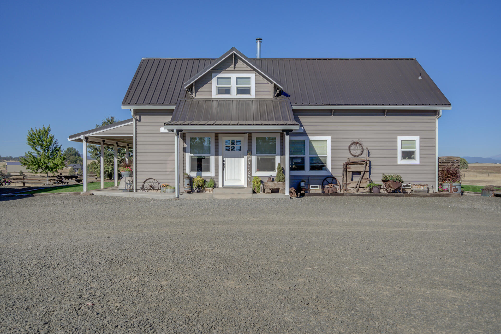 541-105 Pittville Road McArthur, CA 96056 - Photo 17 of 87 a front view of a house with a cars parked