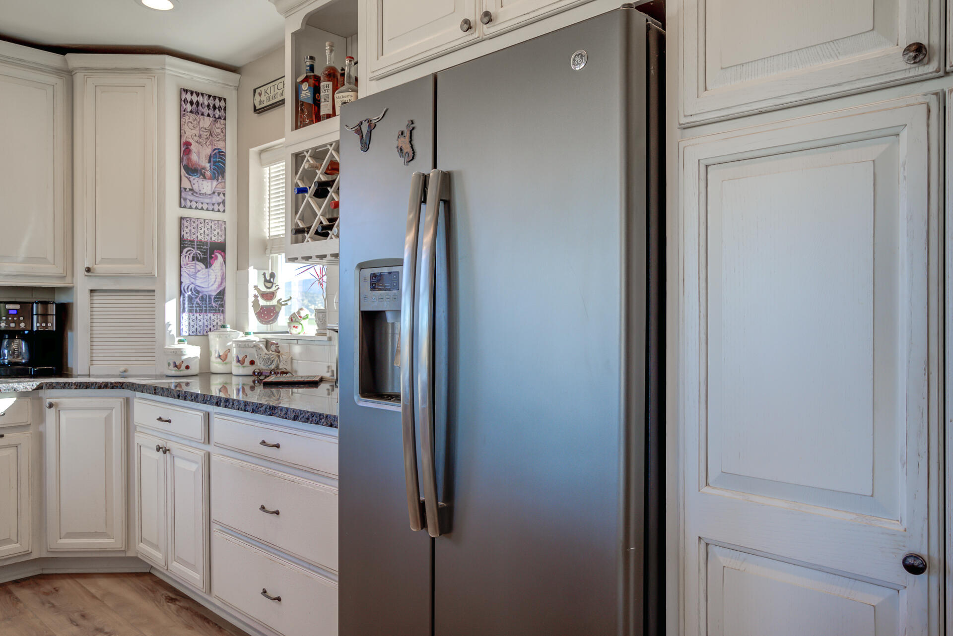 541-105 Pittville Road McArthur, CA 96056 - Photo 31 of 87 a kitchen with stainless steel appliances granite countertop cabinets and a refrigerator