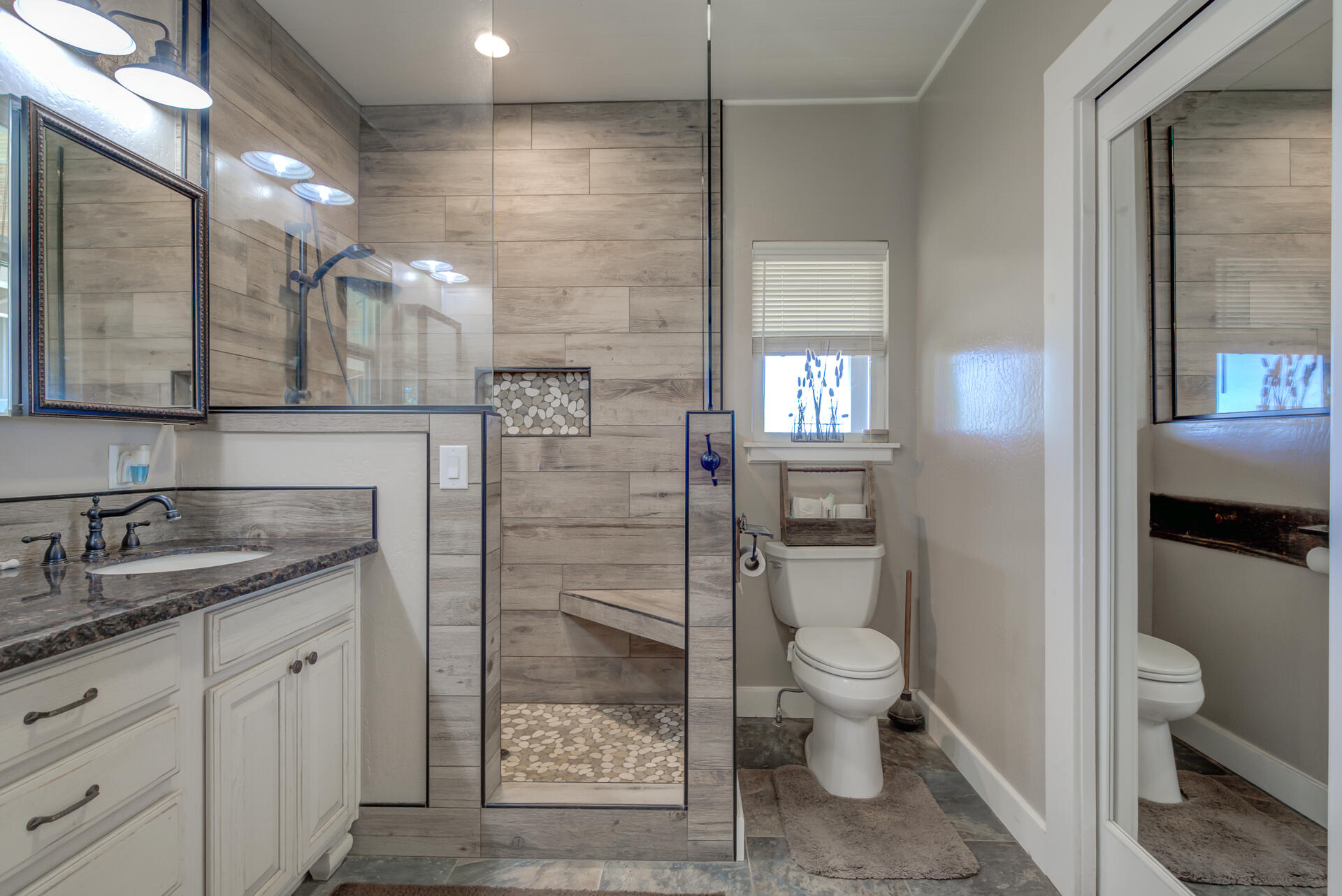 541-105 Pittville Road McArthur, CA 96056 - Photo 37 of 87 a bathroom with a granite countertop sink a toilet and shower