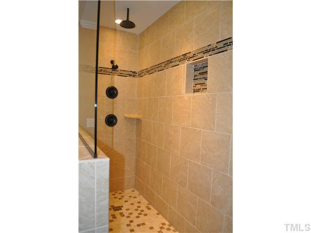 4579 Barber Mill Road Clayton, NC 27520 - Photo 18 of 24 Beautifully tiled, walk in shower in Master - with two shower heads!
