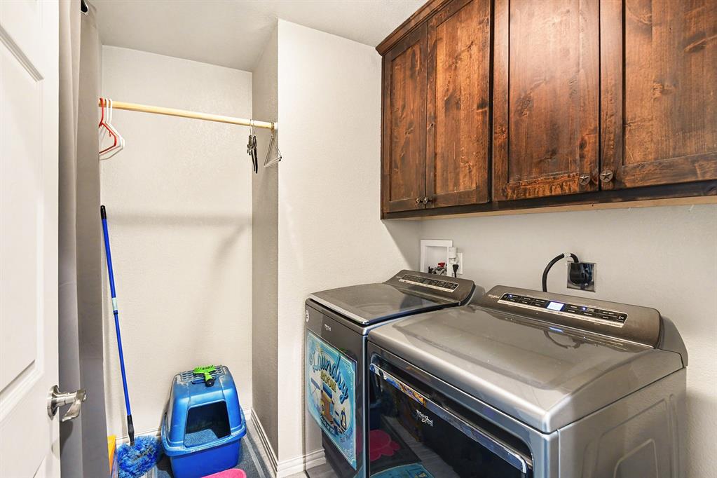 621 North Ave B Springtown, TX 76082 - Photo 23 of 28 a utility room with dryer and washer