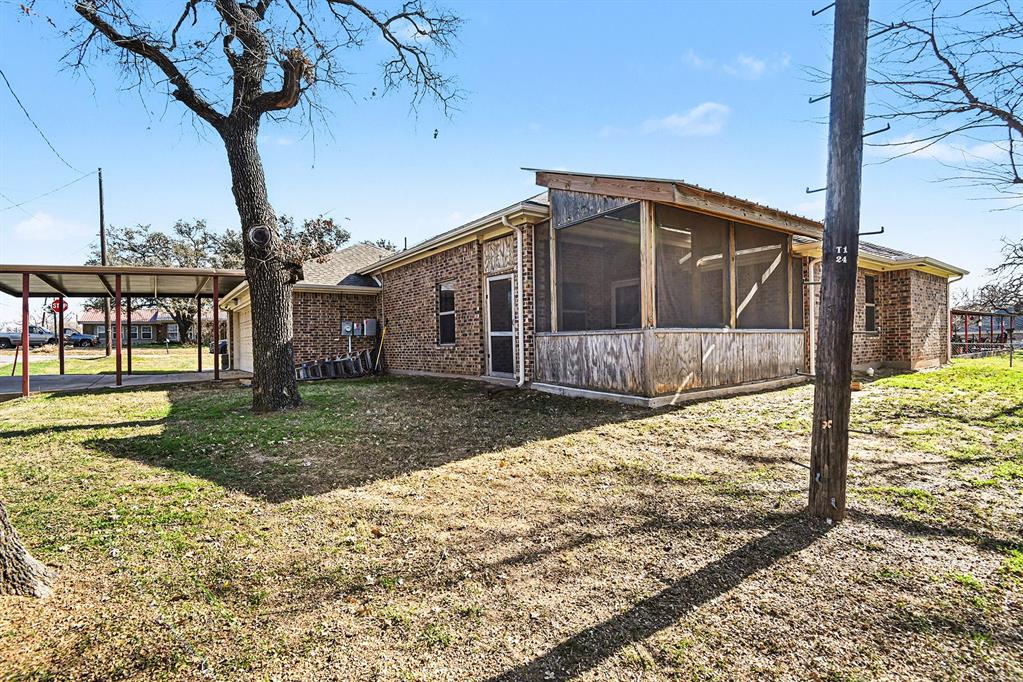 621 North Ave B Springtown, TX 76082 - Photo 28 of 28 a view of a house with a yard